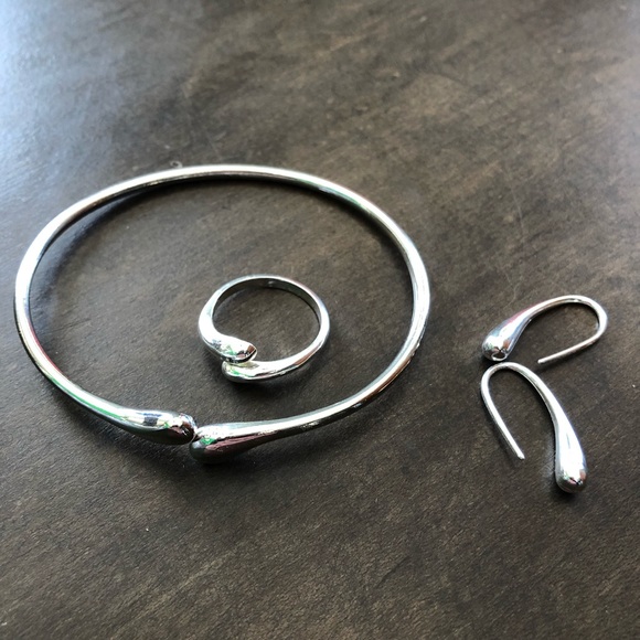 Jewelry - Set of matching silver bracelet, ring and earrings